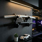 Professional wall-mounted display for two katana swords on a sleek black bracket, enhancing a luxury gaming setup from Dreams Setup.