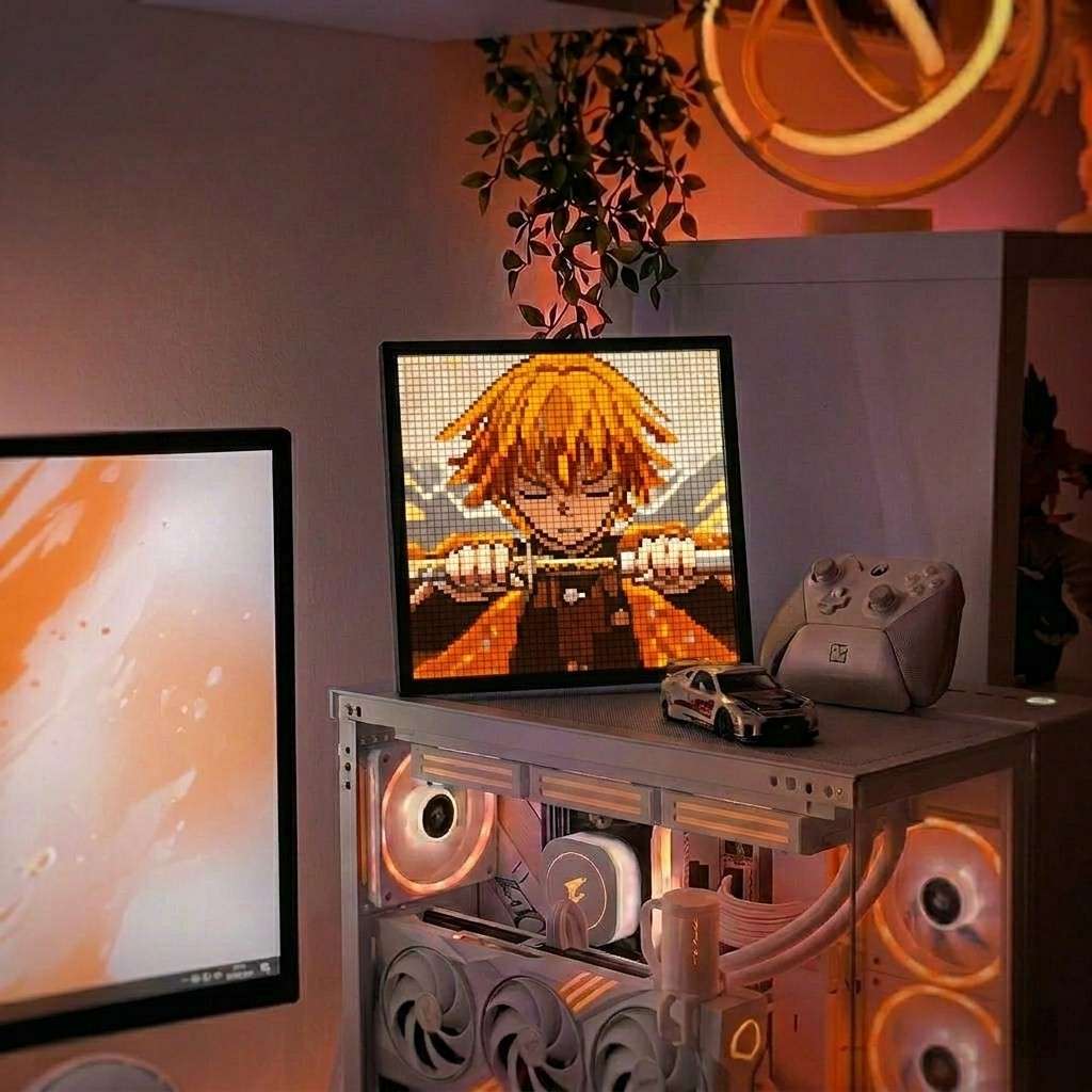 Smart LED pixel art display showing anime character pixel animation on a gaming desk setup with custom ambient lighting by Dreams Setup