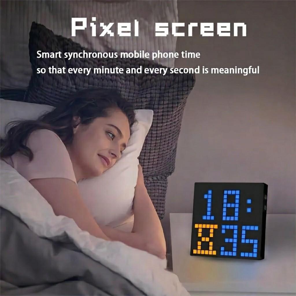 Smart pixel art display used as a bedside digital clock with phone time sync beside a sleeping person from Dreams Setup