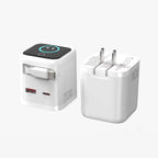 Compact white 70W GaN fast charger from Dreams Setup with a foldable plug design and integrated USB-C cable for easy travel.